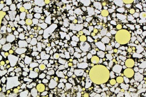  2 Photomicrograph of thin section of FM 10, microstructure with small and large air voids 