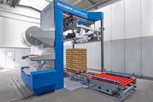  The Beumer stretch hood covers full pallets with a thin film hood 