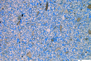  5 LM image of the thin section of the KS- sample impregnated with blue resin a) 10x magnification b) 100x magnification 
