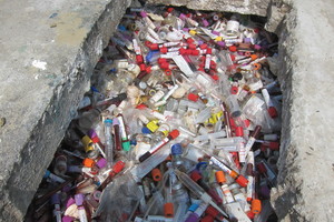  Burying of hospital wastes in a concrete bunker in Yangon/Myanmar 