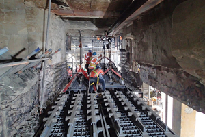  2 polytrack® modules featuring the newest aeration and conveying element design being positioned inside the existing housing. Part of the refractory was removed to ease the installation 