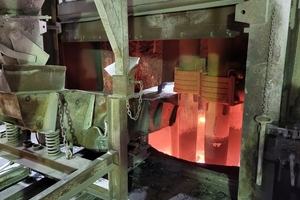  1 Charging of granulated blast furnace slag into the SAF 