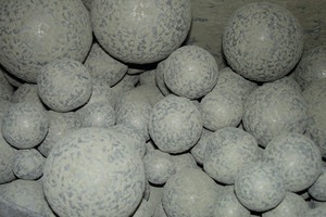  1 (l) The milling media (balls) coated themselves with cement if no grinding aid is used 