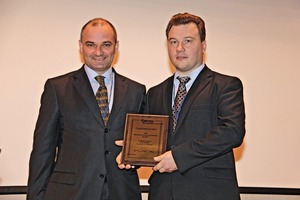  2 Yury Gontsharov (left) welcomes a new member of the Russian Gypsum Association 