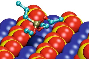  Oblique view of the energetically most favor­able conformations of the silane molecules EEE and EEO on the (020) gypsum surface as van der Waals model (blue = Ca, red = O, yellow = S), silane molecules as stick-and-ball model (light brown = Si, red = O, turquoise = CHn) 