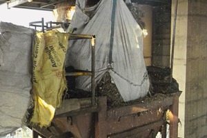  17 + 18 Feeding into the kiln at the cement plant 