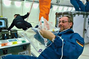  4 Prof. Plank conducting an experiment for cement hydration under zero gravity conditions 