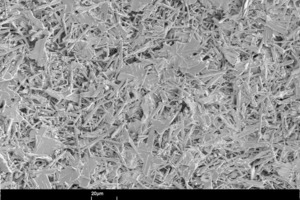  10	Scanning electron photomicrographs a) of the microstructure formed by the starting material, b) of the anhydrite III rich hemihydrate plaster and c) of the anhydrite III free hemihydrate plaster 