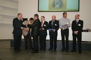  2	Awards for the first pilot plants (from left: O. Jung, M. Gaur, K. Podhora, Dr. E. Kulenkamp, T. Hauri, A. Mansouri, G. Keune) 