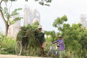  5	Scene in front of a PT Semen Gresik cement plant  