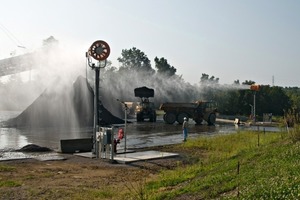 The tower-mounted dust suppression units have a precise aiming capability