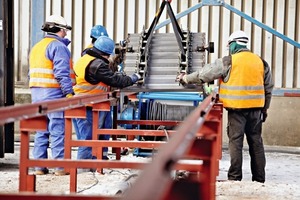 2 Preassembled belt mat segments are mounted