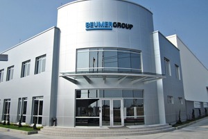 The new building includes a production hall and an administration wing