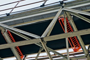 2 The Return Roller Basket was developed to prevent a return roller from falling in the event of a mechanical failure