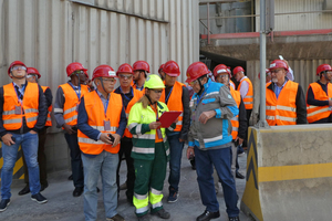 7 The attendees inspected the new calciner in groups