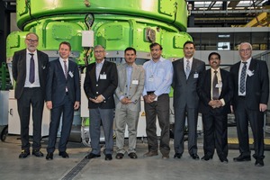 2 The ­delegation of the DG Khan Cement Company together with representatives from Loesche GmbH and Renk AG in front of the new COPE drive after start up in Augsburg