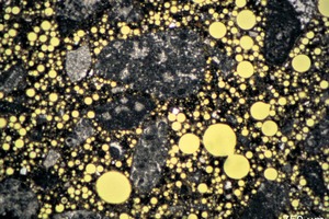 3 Photomicrograph of thin section of TM 20, microstructure with many well distributed small air voids and a few large air voids