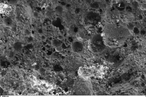 12 SEM micrograph of the fracture face of a thin-bed mortar (sample containing 10 vol.% perlite in 50-fold magnification)