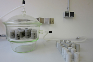1 Experimental setup for the investigation of hydration behavior under CO2-exclusion in an N2 atmosphere or in laboratory air (carbonation)