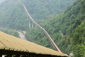 2 Sichuan project: The troughed belt conveyor runs through rough terrain and over instable ground