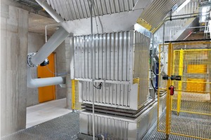 4 Discharge area with aftercoolerFigure 4 top shows from top to bottom: »	Lower end of the kiln shafts»	Support structure of the kiln shafts»	Discharge area of the kiln shafts with inspection doors for the sliding tables»	Insulated lime bunker underneath the discharge tablesFigure 4 middle shows from top to bottom: »	Lower end of the lime bunker»	Kiln discharge trap»	Top end of the aftercoolerFigure 4 bottom shows from top to bottom: »	Lower end of the aftercooler»	Vibrating feeders for discharging the quic