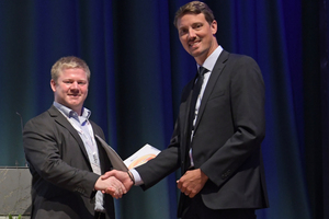 Dr. Johannes Kasper (left) received first place for his work