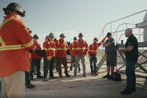 1 MSTs gather near a heavy-duty conveyor specifically set up for training purposes, ready to properly install new equipment